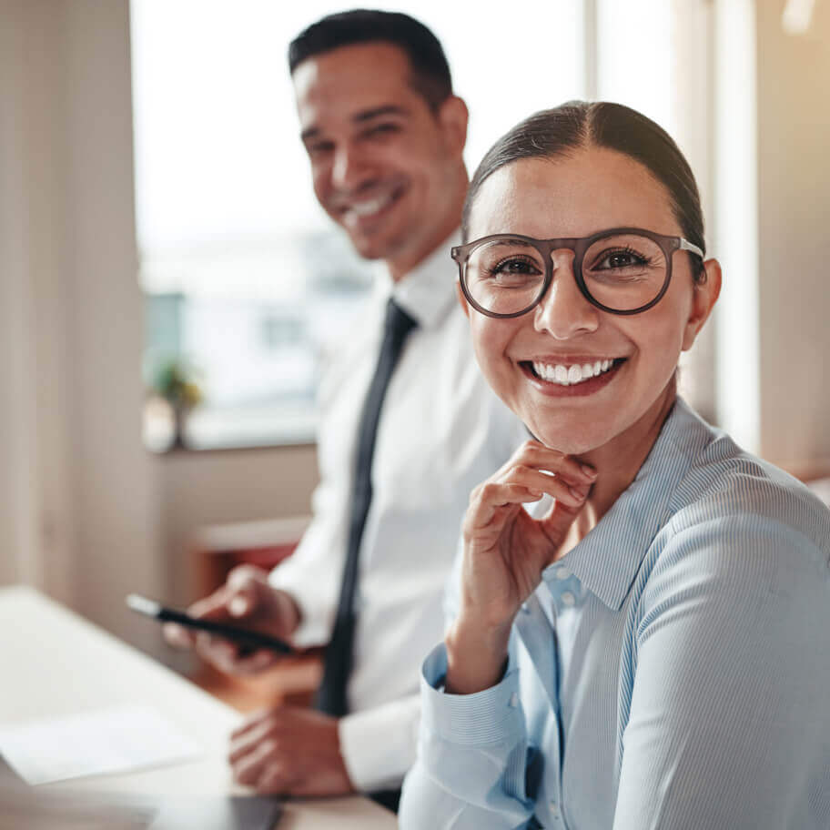business woman wearing glasses smiling